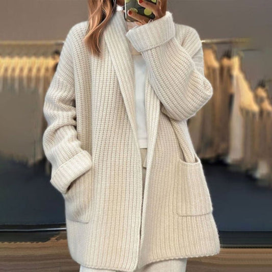 Lumina Wear Amelia cozy oversized knitted cardigan with integrated scarf, featuring soft texture and relaxed fit for casual comfort.
